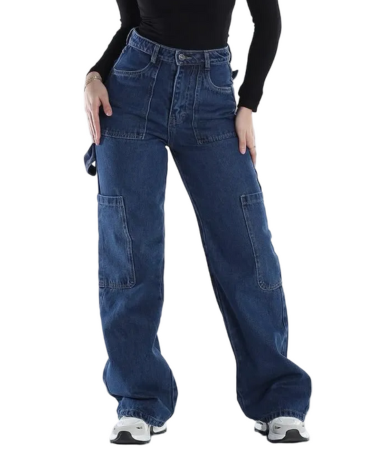 Woman wearing blue jeans and a black top on a white background